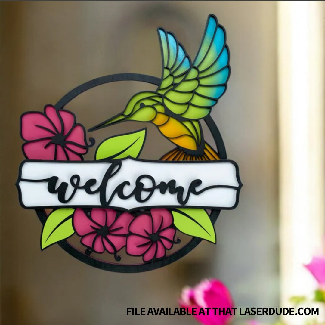 Example of TRULFAT PAINT primed plywood laser project: a color welcome sign with a hummingbird and flowers that looks like stained glass