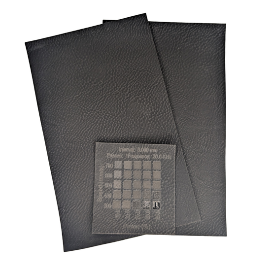 Black on Black faux leatherette images shows materials test done on a 30w Thunder Laer Bolt machine