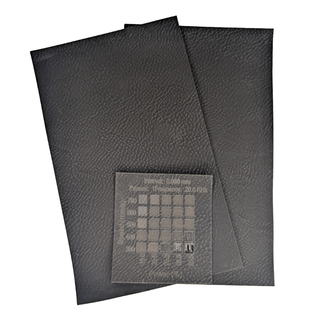 Black on Black faux leatherette images shows materials test done on a 30w Thunder Laer Bolt machine