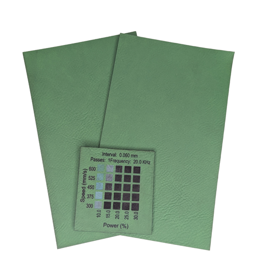 Green faux leatherette Canada image shows a materials test done on a 30w rf Thunder Laser Bolt machine