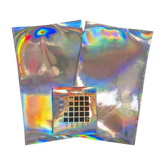 2 Holographic Faux Leatherette samples with a rainbow sheen when light hits. material test